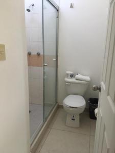 Koupelna v ubytování Suites Cervantes