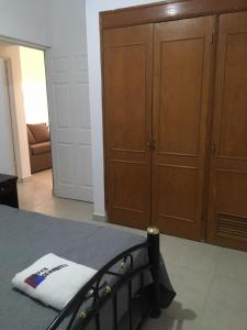 Postel nebo postele na pokoji v ubytování Suites Cervantes