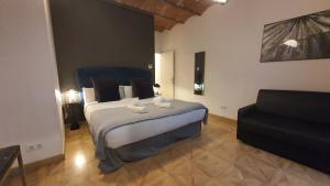 En eller flere senge i et værelse på Barrio Gotico Apartments Escudellers