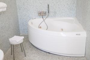 Koupelna v ubytování Hotel Paclà
