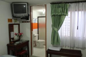 TV a/nebo společenská místnost v ubytování Hostal Isla Señorial