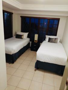 Postel nebo postele na pokoji v ubytování Beautiful Villa - Scottburgh, Durban