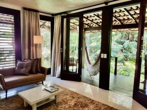 Posezení v ubytování Mangueira Boutique Hotel Moreré