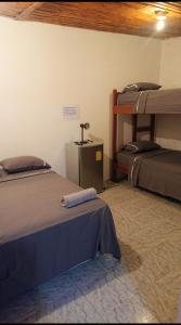 Двухъярусная кровать или двухъярусные кровати в номере La casa de naty by Ecuapolsky