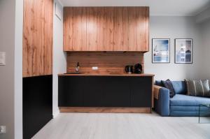 Część wypoczynkowa w obiekcie CITYSTAY Plac Unii Gdynia Apartment