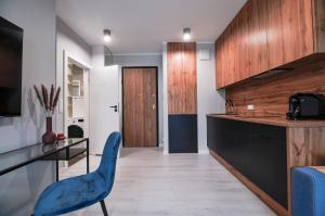 Telewizja i/lub zestaw kina domowego w obiekcie CITYSTAY Plac Unii Gdynia Apartment