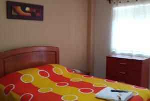Postel nebo postele na pokoji v ubytování Hostal La Casona
