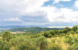 a view of a valley with mountains and trees at Casa Grande in Torricella +17 photos