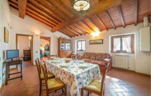 A television and/or entertainment centre at 2 Bedroom Beautiful Apartment In Poppi