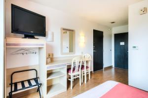 TV a/nebo společenská místnost v ubytování Motel 6-Joliet, IL - Chicago - I-55