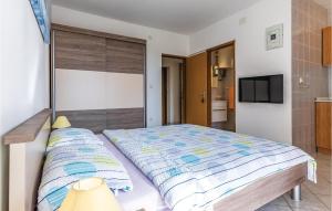 Postel nebo postele na pokoji v ubytování Studio Apartment In Medulin