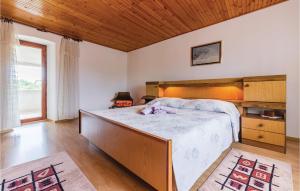 Łóżko lub łóżka w pokoju w obiekcie Apartment Glavani Iv