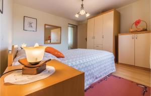 Łóżko lub łóżka w pokoju w obiekcie Apartment Glavani Iv