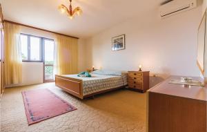 Łóżko lub łóżka w pokoju w obiekcie Apartment Glavani Iv