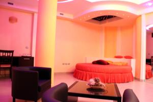Postel nebo postele na pokoji v ubytování Hotel Sette E Mezzo