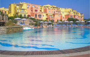 a large swimming pool in front of some buildings at Bilo 4 in Cuile Pazzoni +10 photos