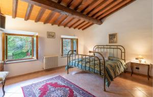A bed or beds in a room at Awesome Home In Dicomano Fi