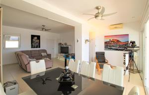 a living room with a couch and a table at Nice Home In El Campello With Wifi in El Campello