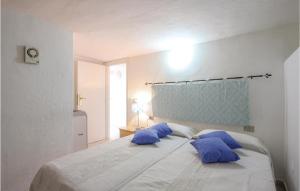 Säng eller sängar i ett rum på La Collina