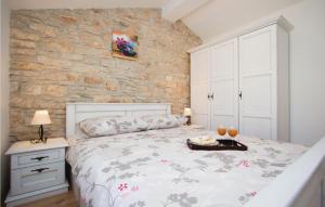 Posteľ alebo postele v izbe v ubytovaní Two-Bedroom Holiday Home 0 In Filipana