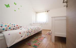 Posteľ alebo postele v izbe v ubytovaní Two-Bedroom Holiday Home 0 In Filipana