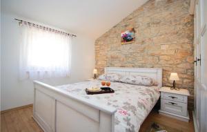 Posteľ alebo postele v izbe v ubytovaní Two-Bedroom Holiday Home 0 In Filipana