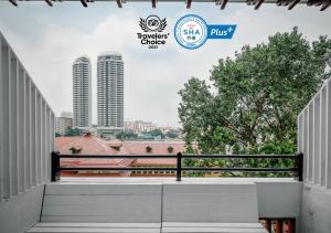 a view of the city from the roof of a building at Casa Picasso Hotel - SHA Plus Certified in Bangkok