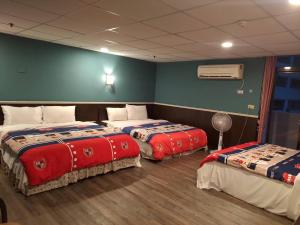 Letto o letti in una camera di 知本溫泉の旅宿