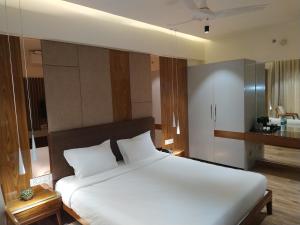 Postel nebo postele na pokoji v ubytování Hotel Florence
