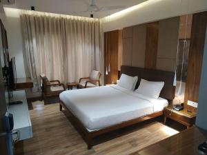 Postel nebo postele na pokoji v ubytování Hotel Florence