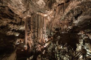 an aerial view of a cave with stalactites at Apartamentos Balcón de Maro in Maro
