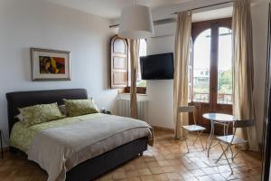 Postel nebo postele na pokoji v ubytování B&B Bellini + 37 fotografií