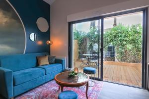 Χώρος καθιστικού στο Maisonnette avec terrasse et parking - Madeleine, il était une fois