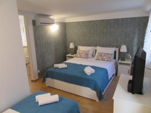 Posteľ alebo postele v izbe v ubytovaní Apartment Lela Split II