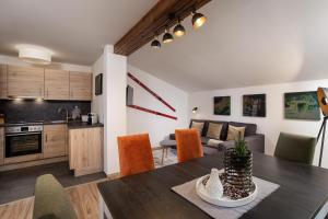 Kuchyň nebo kuchyňský kout v ubytování Alpine View Apartments
