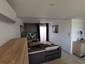 Voodi või voodid majutusasutuse Grand T3 85 m2 situé à 15 min à pied des plages toas