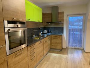 A kitchen or kitchenette at Schusterbrand Appartements