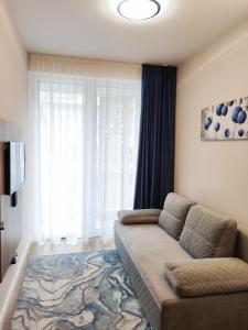 Posteľ alebo postele v izbe v ubytovaní Spa Residence Carbona Siesta Apartman