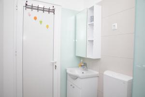 Koupelna v ubytování Apartment Kravica