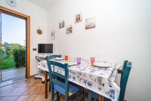 Foto dalla galleria di Appartamento villa da 4 fino a 5 persone giardino a Capoliveri Altre 24 foto