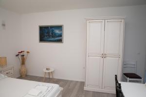 Postel nebo postele na pokoji v ubytování Apartment Kravica
