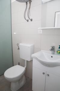 Koupelna v ubytování Apartment Kravica
