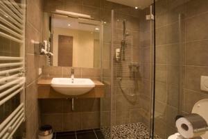 Ванна кімната в Hotel Kirchbichl