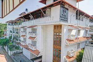a view of a building with balconies at The Fort Manor Hotel - Kochi Kerala in Fort Kochi