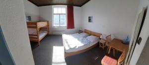 Postel nebo postele na pokoji v ubytování Gasthof Hochalmspitze
