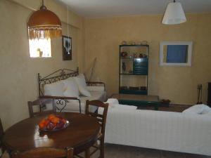 Posteľ alebo postele v izbe v ubytovaní Kyparissis Beach Houses
