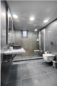 Kúpeľňa v ubytovaní L apartment + 24 fotografií
