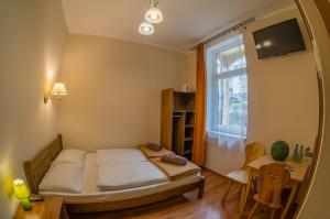 Кровать или кровати в номере Jakubówka
