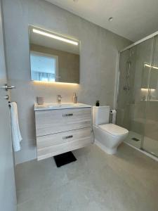 Kúpeľňa v ubytovaní Apartamento nuevo junto al mar con plaza de garaje!! Perfecto para familias