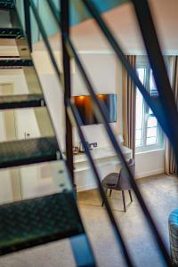 Postel nebo postele na pokoji v ubytování Hôtel-Restaurant Bel Ami